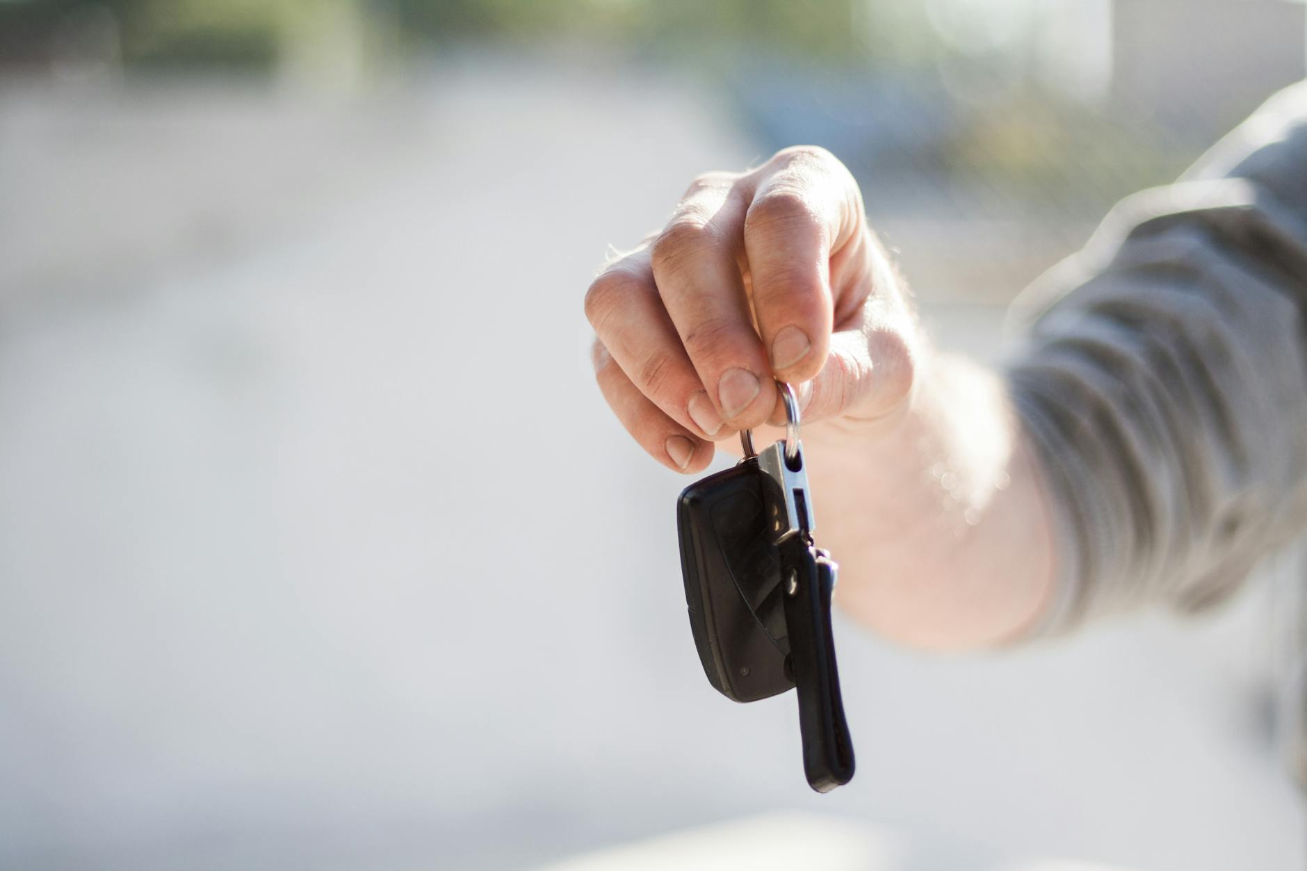Photo by Negative Space on <a href="https://www.pexels.com/photo/person-in-grey-shirt-handing-keys-97079/" rel="nofollow">Pexels.com</a>